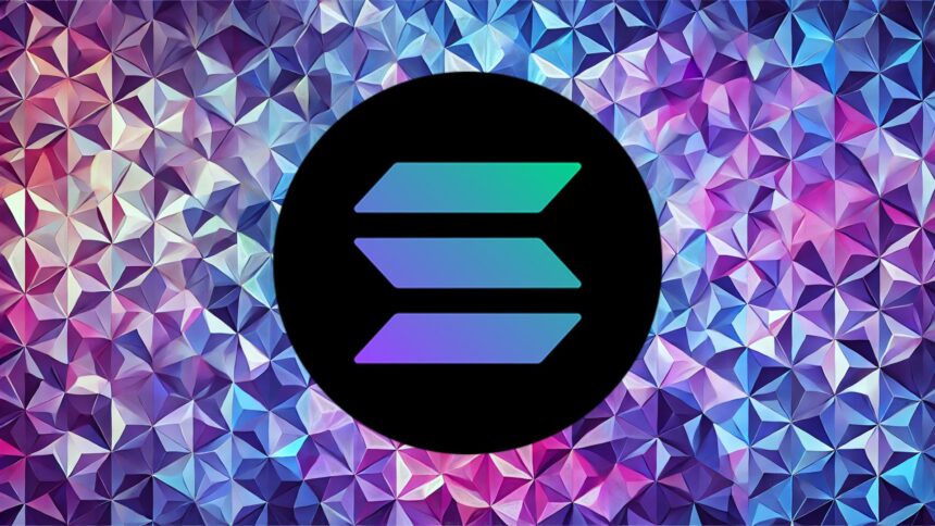 Close-up of red Tesla logo on a white curved surface against a blue sky background