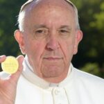 How do Pope Francis's memecoins react after his death?