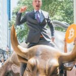 Bitcoin rises as a "magnificent 7" revenue fuel risk take