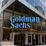 Bitcoin and gold on a balance scale showing comparative value