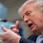 Trump speaking at White House podium about tariffs